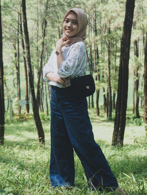 Portrait of a smiling confident woman in her 30s.